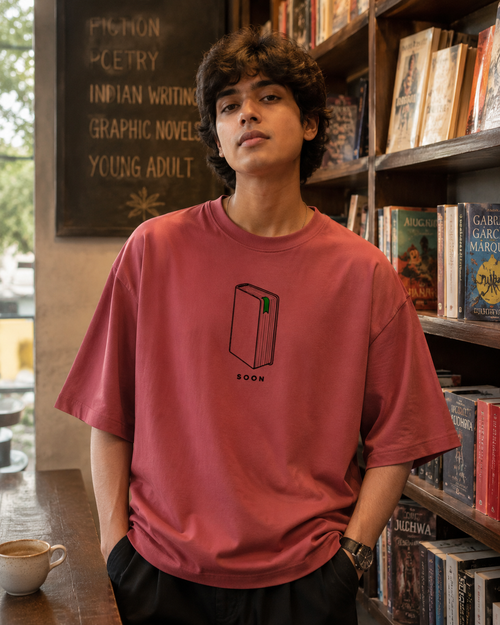 Back view of Bookmark on Page Three Oversized Graphic T-Shirt in heavyweight cotton