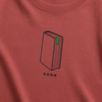 Front view of Bookmark on Page Three Oversized Graphic T-Shirt with relaxed unisex fit
