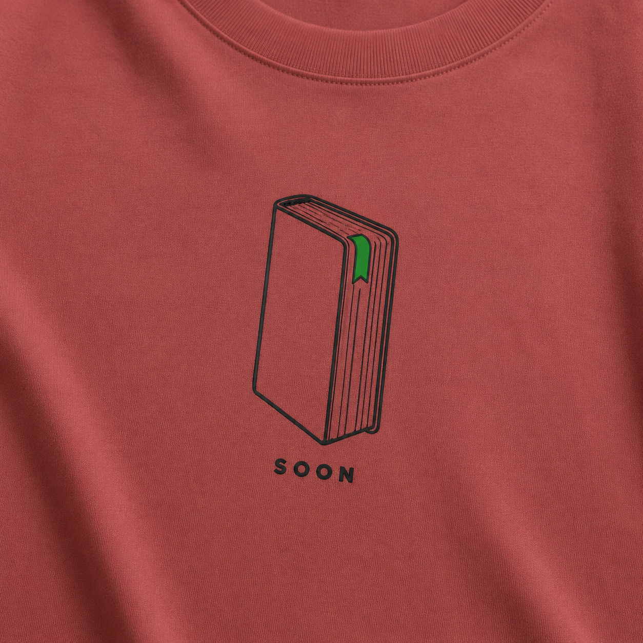Front view of Bookmark on Page Three Oversized Graphic T-Shirt with relaxed unisex fit