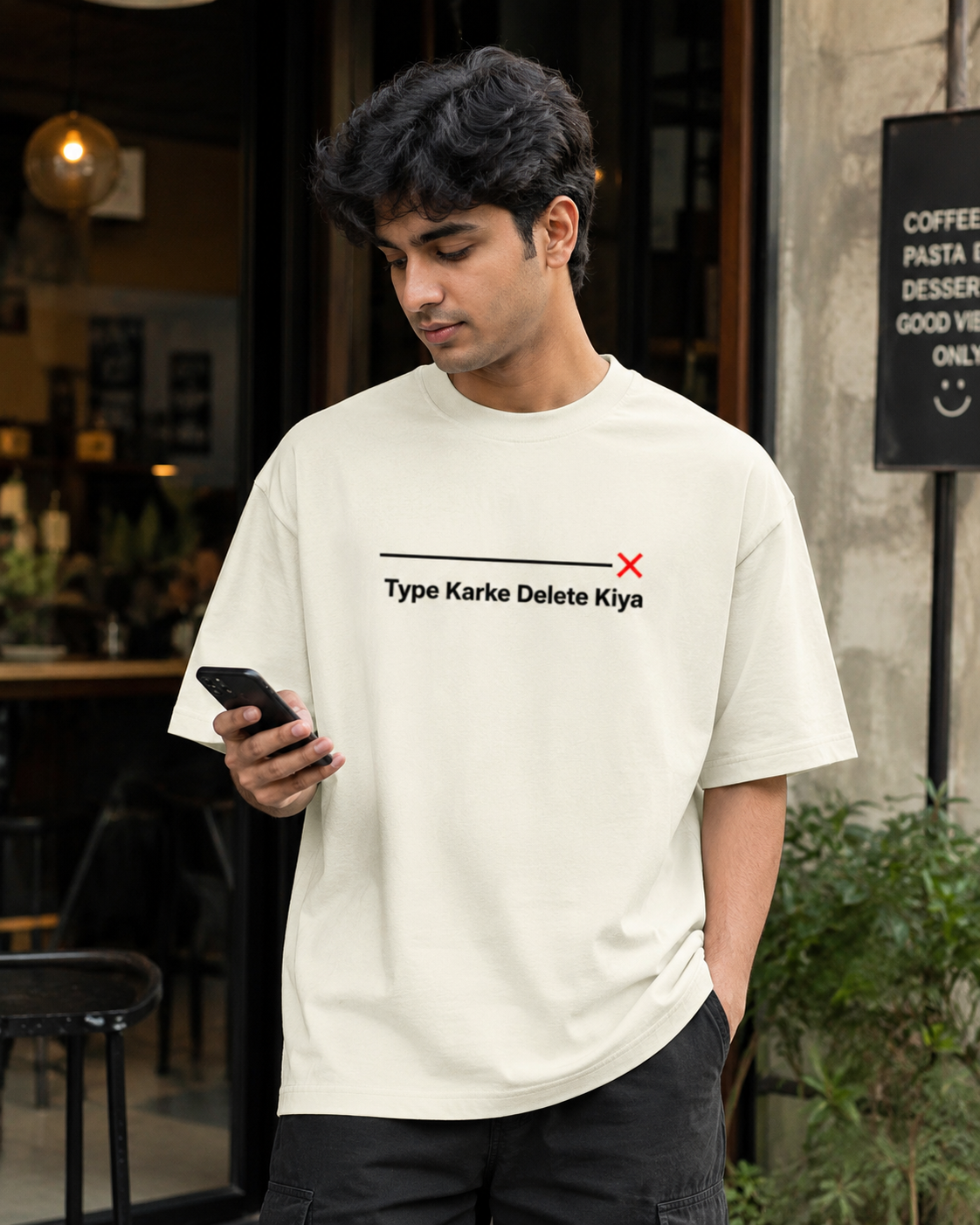 Back view of Type Karke Delete Kiya Oversized Graphic T-Shirt in heavyweight cotton